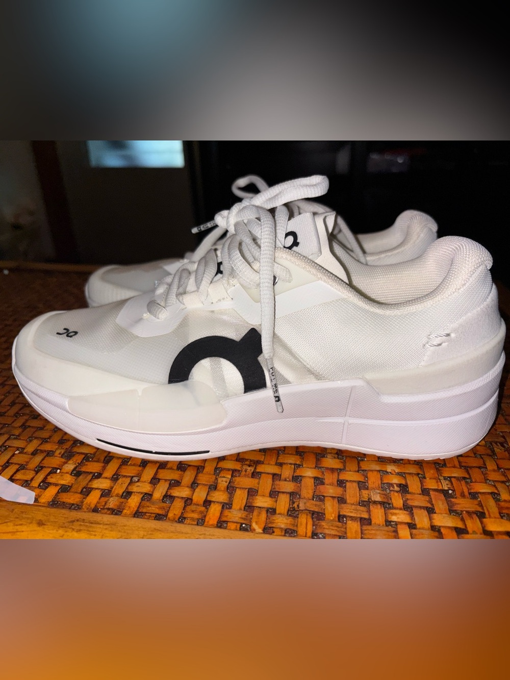 On Running Women’s White Sneakers with Black Logo